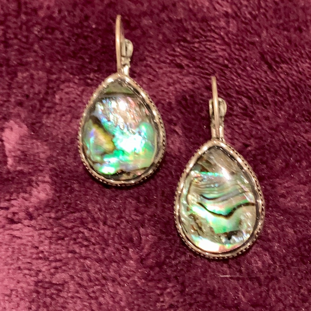 Like vintage looking silver color earrings.